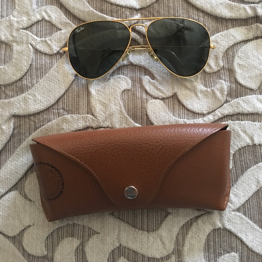 Men’s Gold framed ray bans Sold.